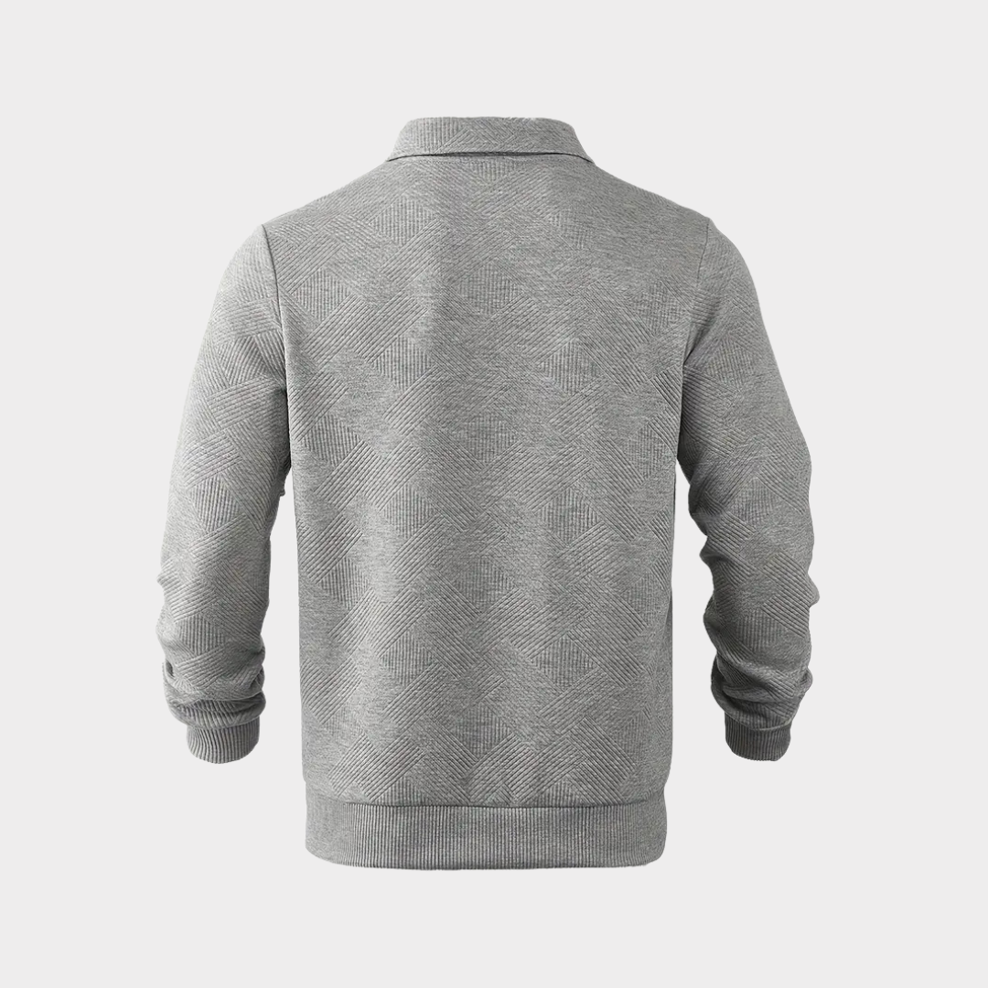 Grå herresweater med mønster, set bagfra. Stilfuld og moderne design, perfekt til efterår og vinter. Komfortabelt og trendy valg til mænd.