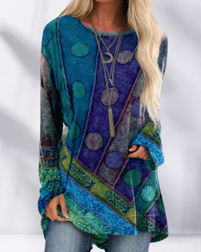 Langærmet bluse i boheme-stil med farverigt, abstrakt mønster og rund hals. Perfekt til afslappet mode og trendy efterårslook.