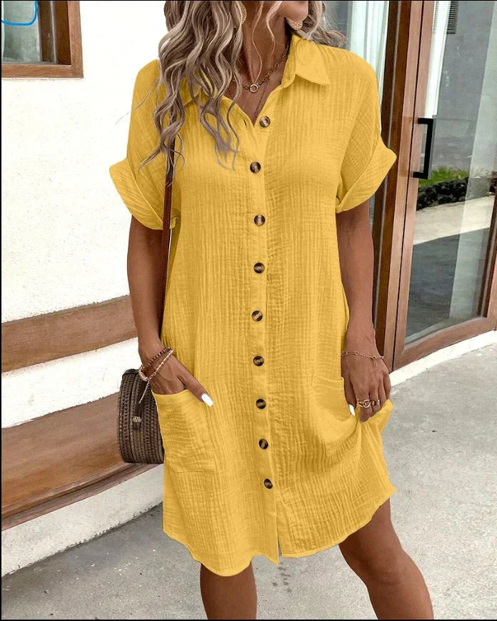 Abito chemisier da donna con bottoni e lunghezza midi