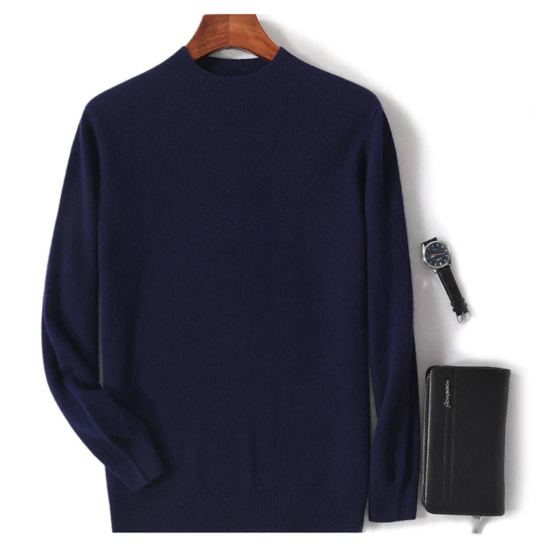 Mørkeblå herresweater på bøjle, sort ur og sort læderpung. Stilfuldt herretøj, modeaccessories, minimalistisk design.