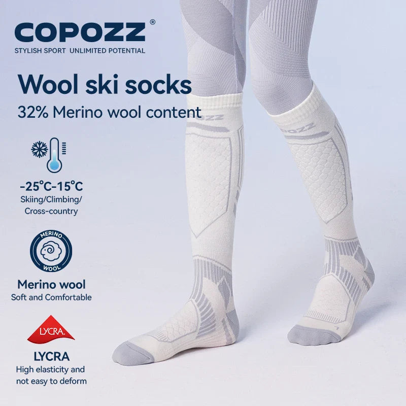 Copozz uld skistrømper med 32% merinould, designet til skiløb og klatring. Komfortable, elastiske og varmebestandige til -25°C.