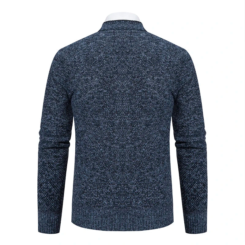 Blå striktrøje til mænd set bagfra, langærmet med meleret mønster. Perfekt til vintermode og casual stil. Komfortabel og stilfuld beklædning.