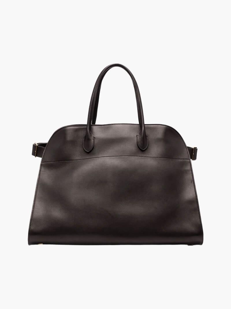 Sort læderhåndtaske med to håndtag, elegant design, perfekt til modebevidste kvinder. Stilfuld og praktisk til hverdagsbrug.