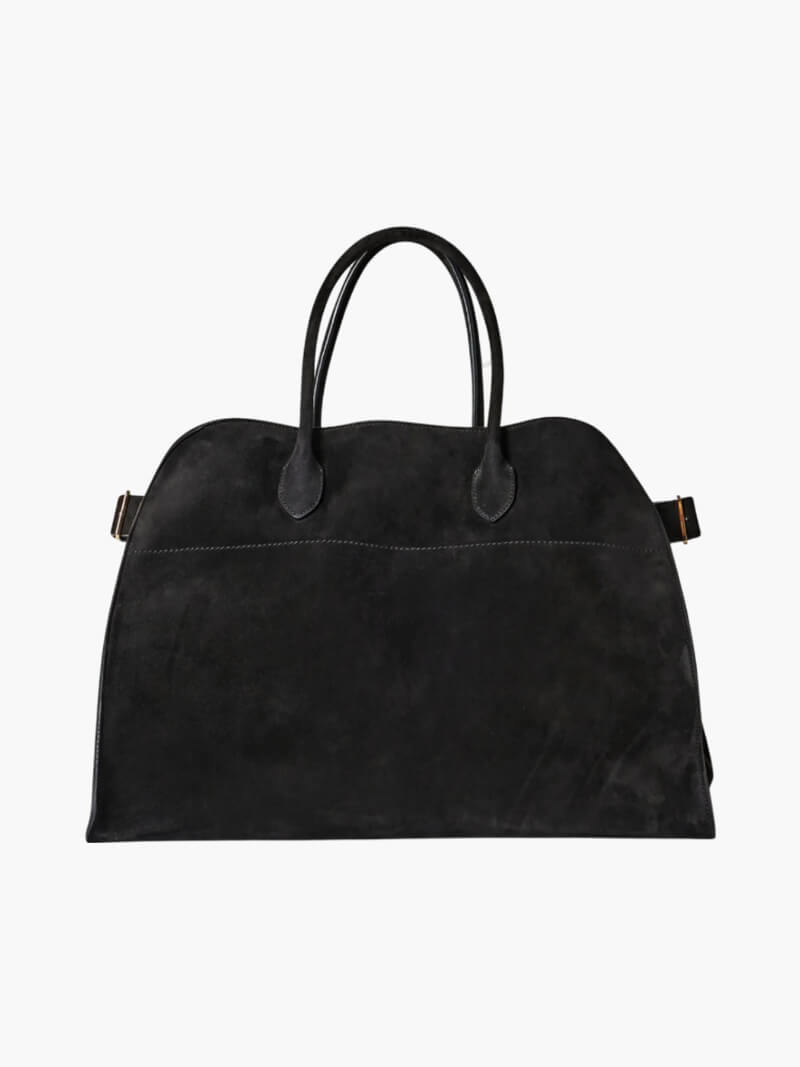 Sort lædertaske med to håndtag, minimalistisk design, ideel til rejser og hverdag. Stilfuld og rummelig taske til kvinder, perfekt til modebevidste.
