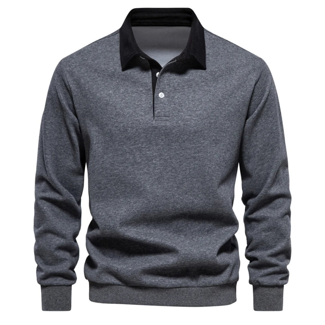 Grå herretrøje med sort krave, langærmet og knaplukning. Stilfuld og moderne design, perfekt til casual og formelle lejligheder.