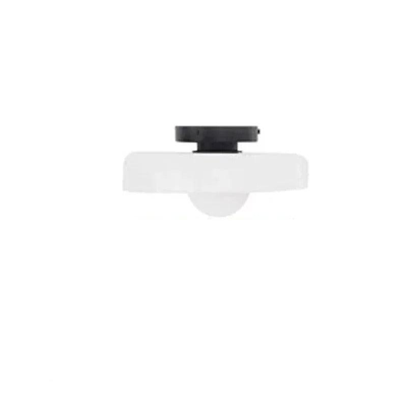 Loftlampe i moderne design med sort base og hvid skærm. Ideel til stue eller køkken. Energibesparende LED-belysning.