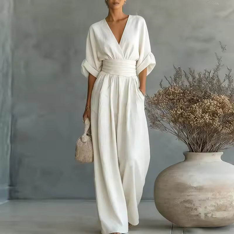 Elegant jumpsuit med dyb V-udskæring og brede ben
