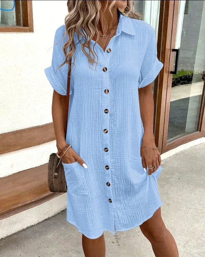 Abito chemisier da donna con bottoni e lunghezza midi