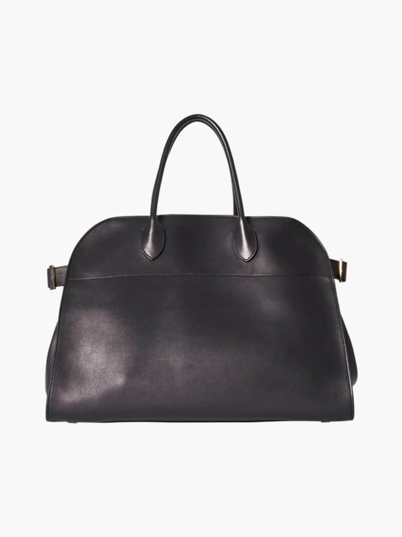 Sort læderhåndtaske med to håndtag, elegant design, perfekt til modebevidste kvinder. Stilfuld og praktisk til hverdagsbrug.