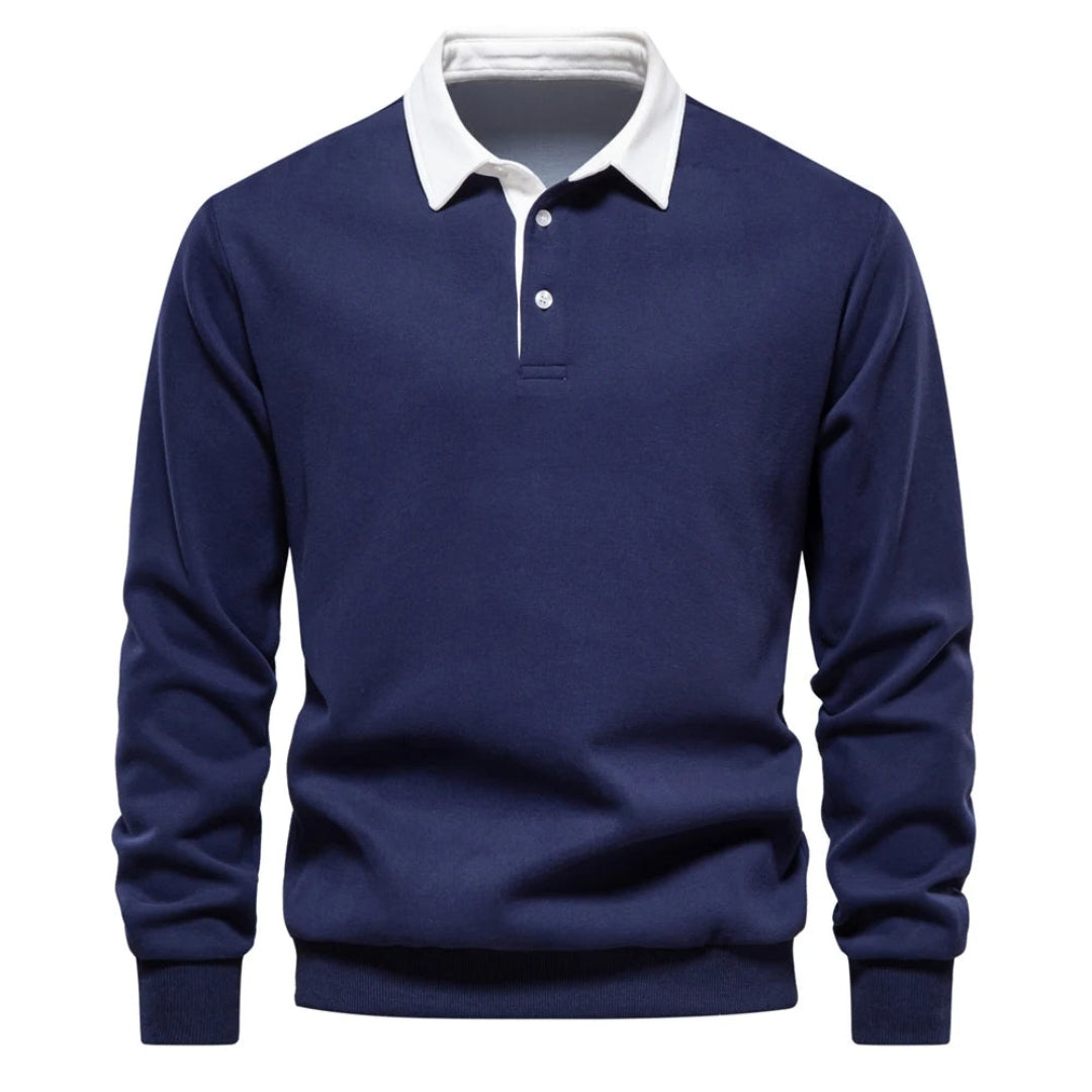 Mørkeblå herrepoloshirt med lange ærmer og hvid krave. Klassisk design, perfekt til casual og formelle lejligheder. Komfortabel og stilfuld.