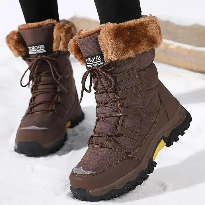 Winter boots with faux fur lining and lace-up for women in Brown
